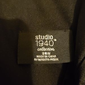 Black dress with blue ties in front and back.